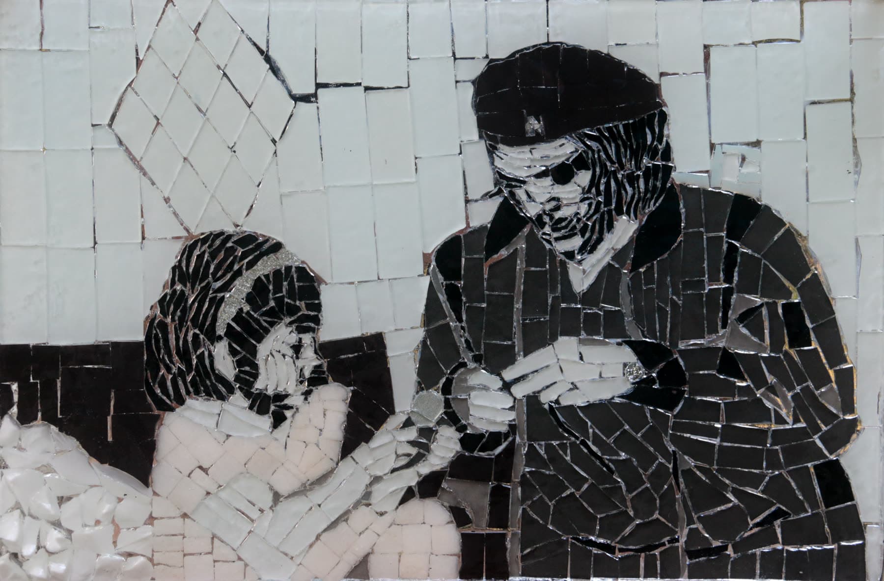 Mosaico en vidrio con Che Guevara junto a su hija Aleida.